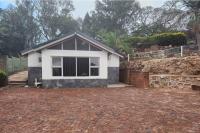Room 1 of 8 Cozy Suites at The Hilltop Guesthouse - B&B Harare