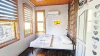 Queen Room with Shared Bathroom