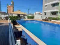 Easy Club 308 Apto 2 quartos Ar condicionado Wi-Fi Netflix Prime piscina Elevador Churrasqueira Sacada 200 m da praia Ideal para Famílias e Amigos Reserve agora - B&B Bugres