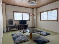 Quadruple Room with Shared Bathroom