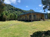 Cabaña con árboles nativos en su patio. - Ferienwohnung Lenca