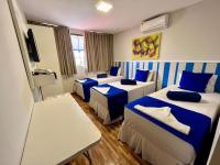 Camera Tripla Economy