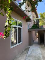 Sumaku Beach House - Chambres d’hôtes Bwejuu