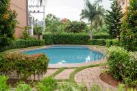 Cozy Crib Suite Condo with Balcony Pool & Gym - Bed and Breakfast Puerto Princesa City