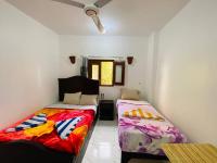 Deluxe Room (2 Adults + 1 Child)