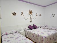 Camera Quadrupla con Bagno in Comune