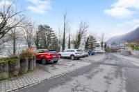 ReMo I 4 Seasons Apartment I 1-4 Personen I See, Bergsicht I 65'' Smart TV, Tischkicker und Badewanne I Parkplatz - Chambres d’hôtes Ingenbohl