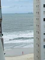 Vista ao Mar Praia Pitangueiras Servico de praia Garagem - Chambres d’hôtes Guarujá