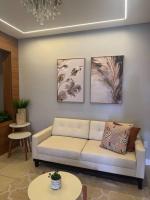 Belo apartamento próximo á praia com garagem - Bed and Breakfast