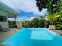 Sun7 Appart T1, avec piscine partagée, vue panoramique sur la nature - Chambres d'hôtes Petit-Bourg