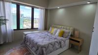 Cozy Studio at Baseline Prestige in the Heart of Cebu City - Chambres d'hôtes Cebu