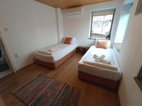 Tweepersoonskamer met 1 of 2 Bedden en Gedeelde Badkamer