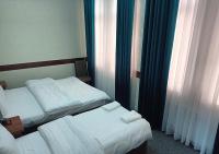 Tweepersoonskamer met 2 Aparte Bedden