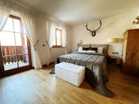 Lüch dl Mone y Chalets - Ferienwohnung Abtei
