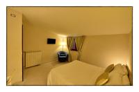 Two-Bedroom Deluxe Apartment with Garden View