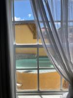 Doppel-/Zweibettzimmer mit Poolblick