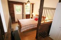 Suite met Queensize Bed en Patio