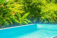 Loft piscina, ar condic, area de lazer e natureza - B&B Ubatuba
