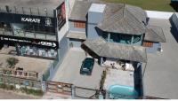 Moradas do Pier 2- apartamento a passos da areia, com vista perfeita da praia e plataforma em Tramandaí! - B&B