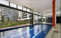 Cozy Zetland 2 bedroom apt with pool, gym and parking - Ferienwohnung
