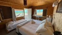 Kamer met Kingsize Bed en Uitzicht op Zee