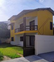 Casa em frente à Praia dos Padres - B&B Aracruz