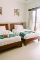 Standaard Tweepersoonskamer met 2 Aparte Bedden en Uitzicht op Zee