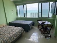 Apto em frente ao mar prédio redondo linda vista - Chambres d'hôtes Peruíbe