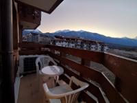 One-Bedroom Apartment with Balcony and Mountain View