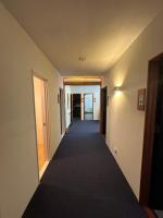 Camera Doppia con Letti Singoli e Bagno in Comune