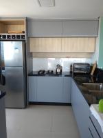 Amplo apartamento em Torres - 4 dormitórios - B&B Torres