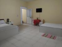 Tweepersoonskamer met 1 of 2 Bedden en Gedeelde Badkamer