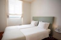 Camera Matrimoniale/Doppia con Letti Singoli con Bagno in Comune