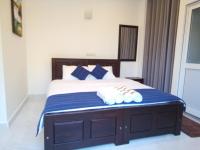 Habitación Doble con balcón (2 adultos + 1 niño)