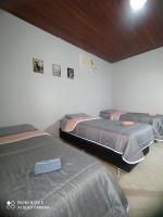Habitación Triple Básica con baño compartido