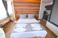 Kamer met Queensize Bed en Uitzicht op Zee