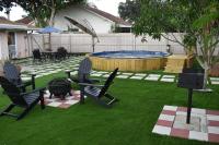 Blisscapade Pool Movie Theater Games Backyard - B&B Palm Bay
