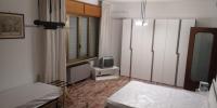 Camera Matrimoniale/Doppia con Letti Singoli con Bagno in Comune