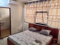 Tadagbe Appart Ch-salon - B&B Cotonou