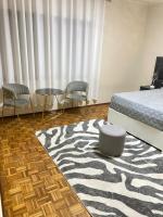 Quartos privados em uma casa comum - B&B Lubango