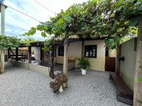 Casa privativa com piscina na Praia da Ferrugem duas quadras mar REF 100 - Chambres d’hôtes Garopaba