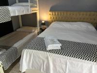 Chambre Quadruple avec Salle de Bains Privative