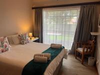 Deluxe Two-Bedroom Apartment with Garden View