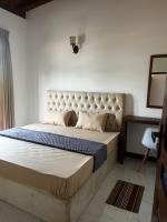 Chambre Lit Queen-Size Deluxe