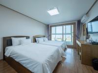 Doppel-/Zweibettzimmer mit Meerblick