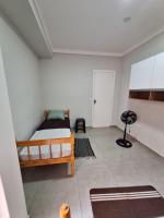 Single Bed in Male Dormitory Room with Shared Bathroom