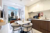 Exclusive 1-Bedroom Apartment with Breathtaking Burj Khalifa Views in the Heart of Dubai - Chambres d'hôtes Dubaï