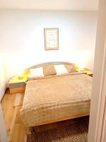 Kamer met Queensize Bed en Uitzicht op de Tuin