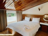Kamer met Kingsize Bed en Uitzicht op de Tuin
