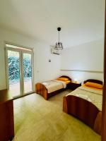 Chambre Double ou Lits Jumeaux - Vue sur Jardin